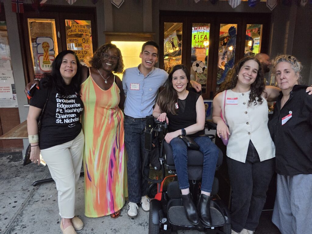 Members of the community board pose for a picture.